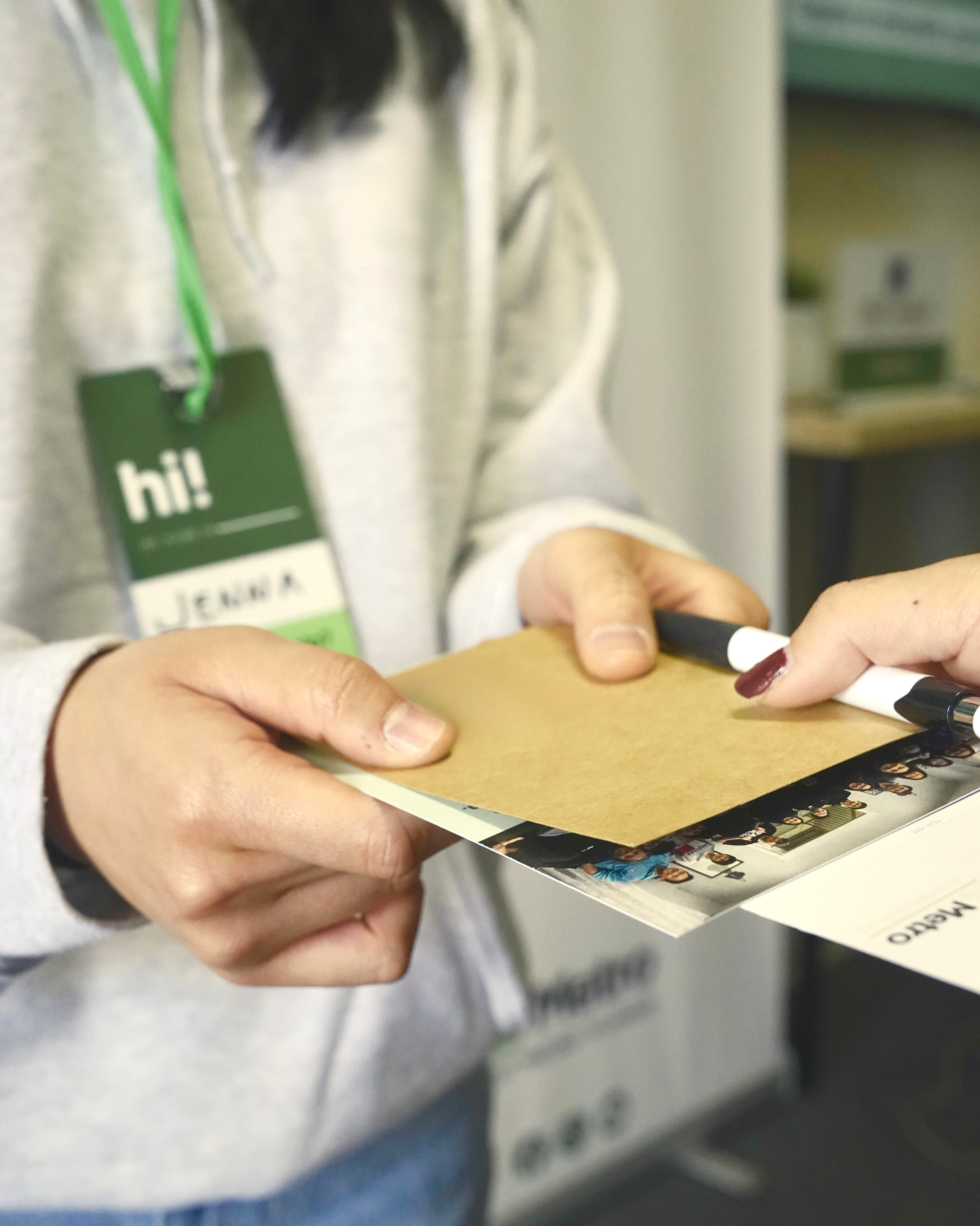 A person writing in a book