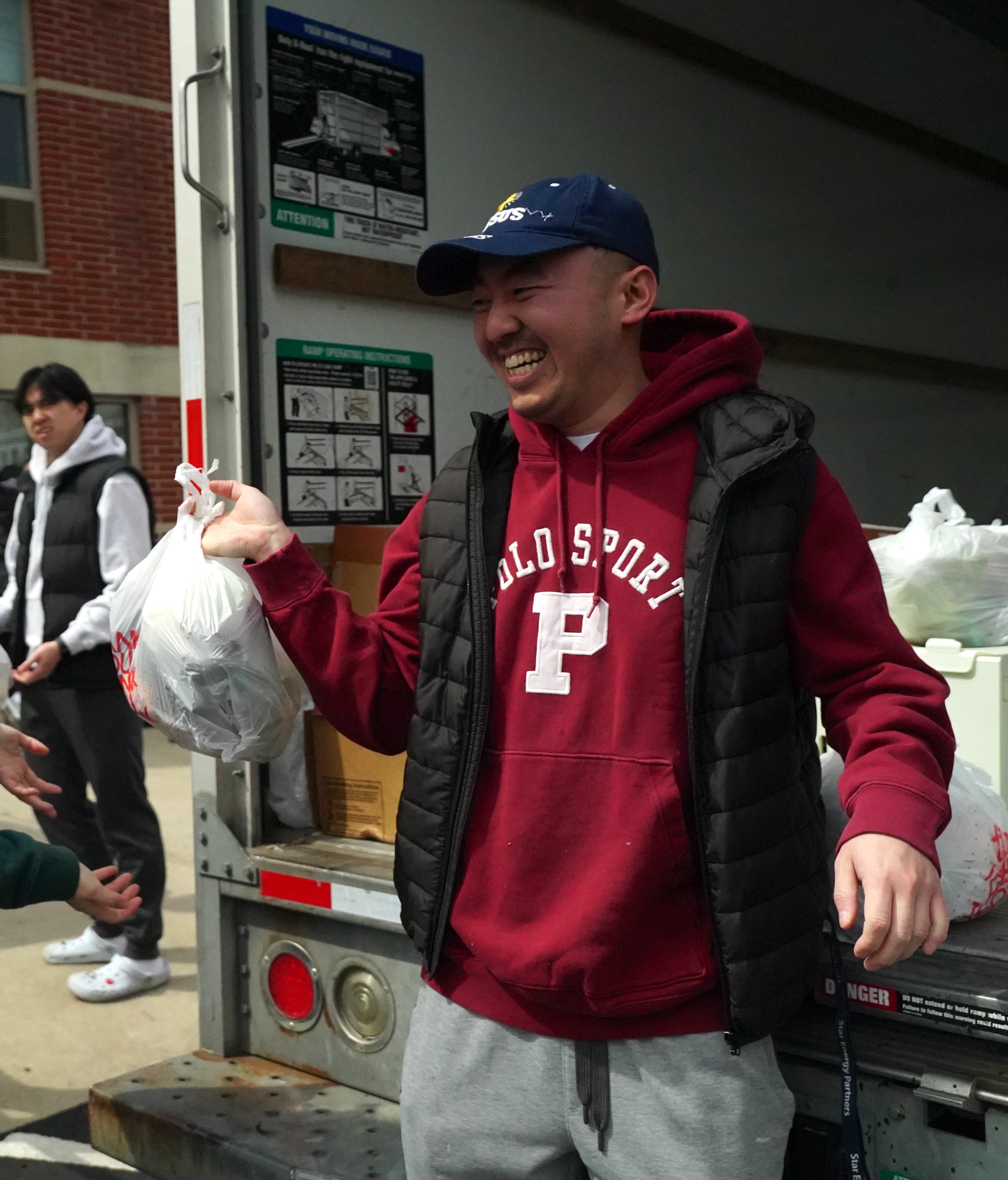 A person writing in a book