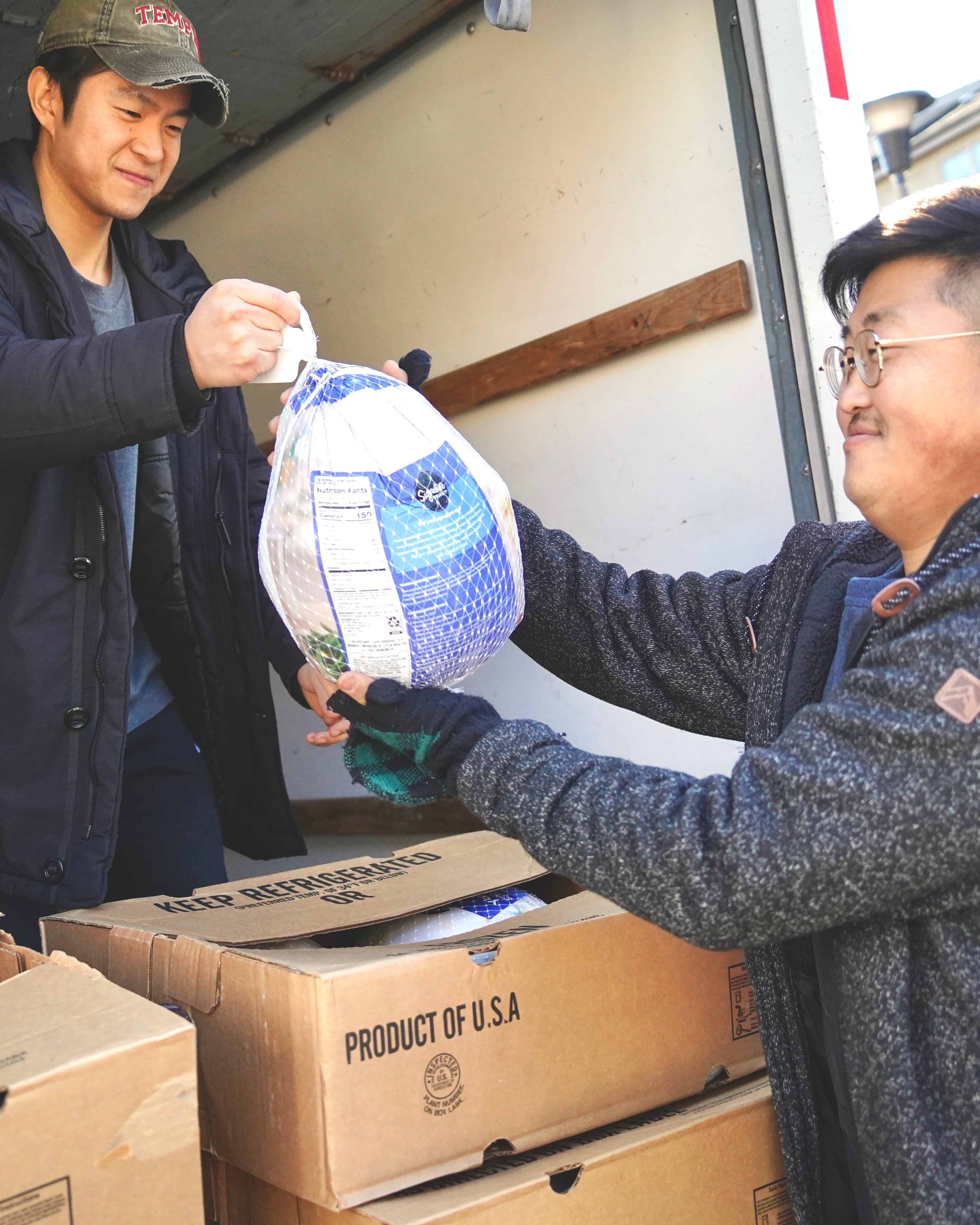 A person writing in a book